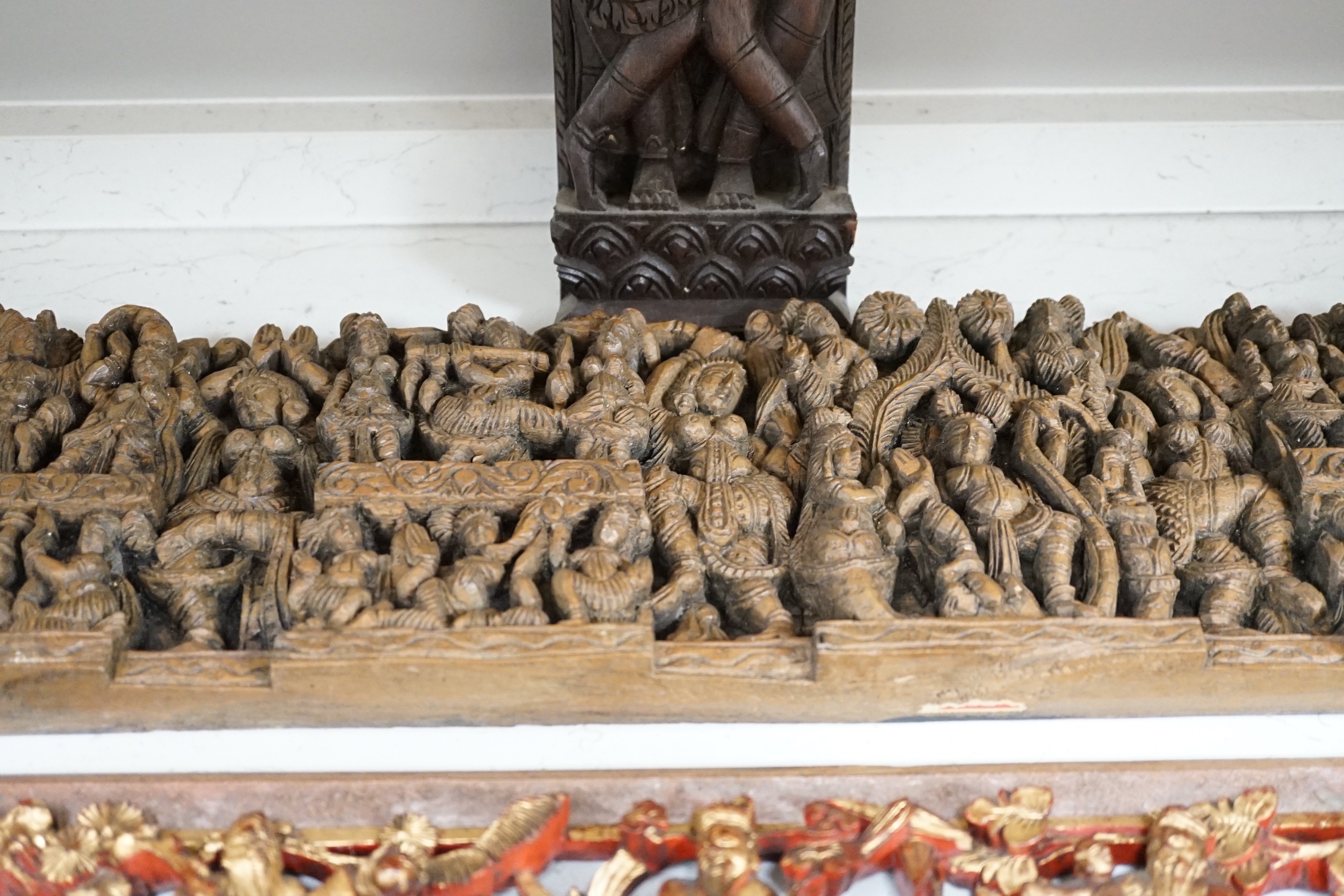 Two South East Asian carved hardwood panels together with three Chinese gilt wood panels (5) largest 6x91cm